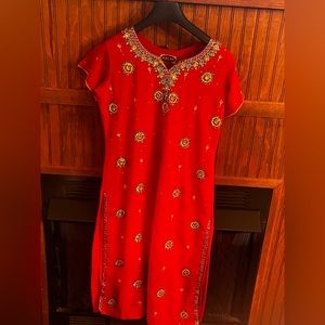 Beautiful embellished dress with a BoHo/Indian style. Slips up both sides